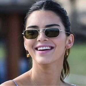 Gold safety pin earrings